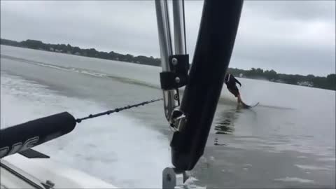 Overconfident Water Skier Trips On Ball And Falls Face Down