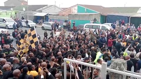 Final whistle for Fleurs: Thousands gather for football star’s funeral