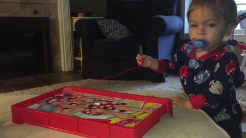 Little boy plays Operation and gets confused by the buzz