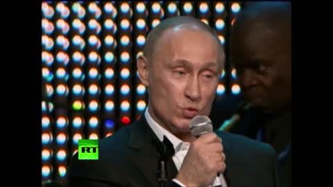 Putin Croons for Charity