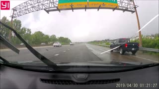 Driver Deftly Dodges Fallen Wheelbarrow