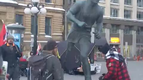 Peaceful protesters cleaning the Terry Fox statue! CBC won't show you this!