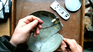 Traditional, lacquer based kintsugi, removing tape