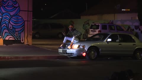 Funny Police Chase - Man Sits on hood of car, then runs And Gets tackled by LAPD officers