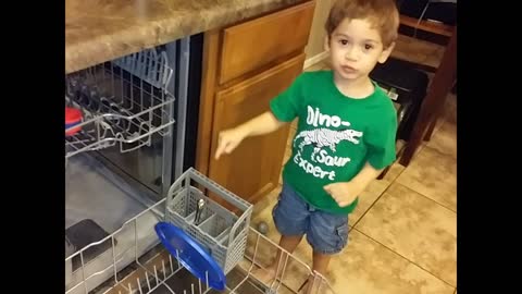 3-year-old helps do the dishes