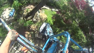 Echo Chainsaw and Genie 65 foot man-lift trimming trees