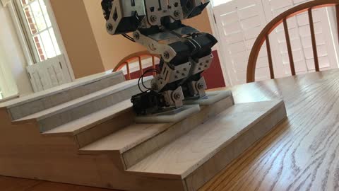 Humanoid robot flawlessly walks down stairs