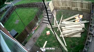 Guy Tearing Down Fence Takes a Tumble