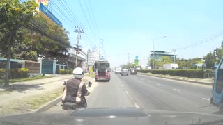 Close Call for Motorcyclist in Thailand