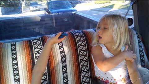 3 year old Tori singin in the truck