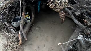 Homeless Guy Dug Out shelter in the woods [Gvmt owned real estate]