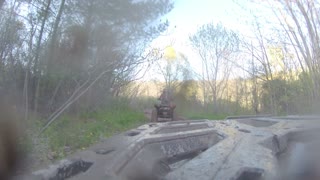 ATV through Mud on a Trail