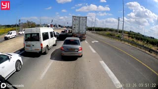 Unsecured military armored personnel carrier falls off truck