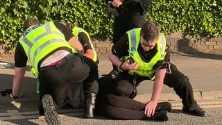 Multiple Police Takedown Woman in the Street