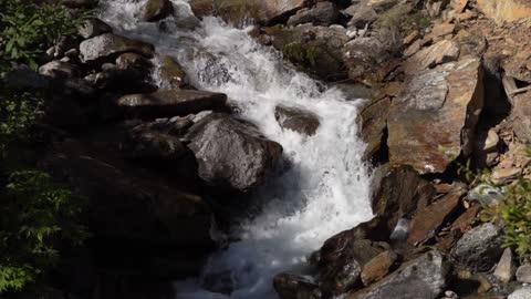 River Flowing with Rocks