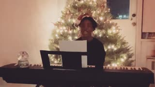 Christmas Tree Interrupts Kid's Virtual Performance for School