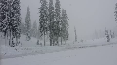 Major west coast storm brings flooding and snow