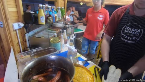 Luxury 24karat Gold-Coated Sausage. Huge 'Kielbasa' Sausages. Poland Street Food in Sopot