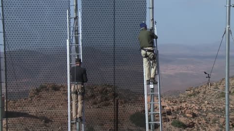 Producing drinking water from fog_ See how Waterfoundations fog net CloudFisher works