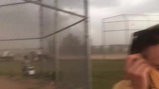 Softball Game Interrupted by Intensely Strong Winds