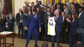 Stephen Curry presents Biden and Kamala Harris with a jersey