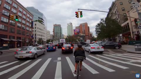 Bike Messenger Riding Fast and Fluid Through NYC Traffic