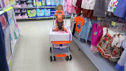Kid Shopping at the supermarket