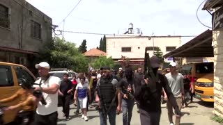 Palestinians mourn man slain in Israeli raid