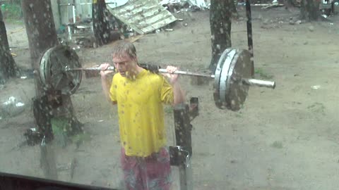 Working Out In The Rain Doing 315lbs Full Squats With No Safety Bars, Belt, Equipment