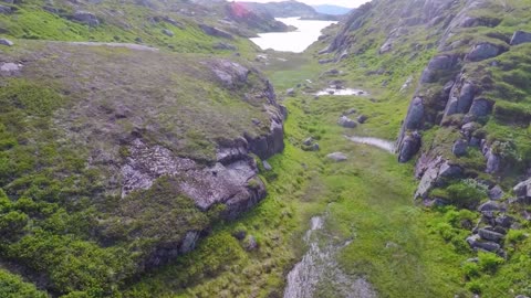 flying slowly over mountain plateau high above sea level