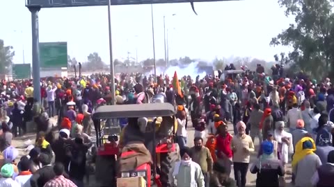 Security forces tear gas protesting Indian farmers
