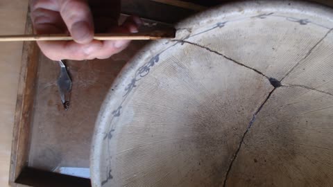 Traditional, lacquer based kintsugi, applying sabi to mortar.