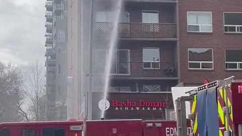 Man and Cat Escape Apartment Fire