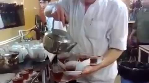 How tea being served in traditional cafe