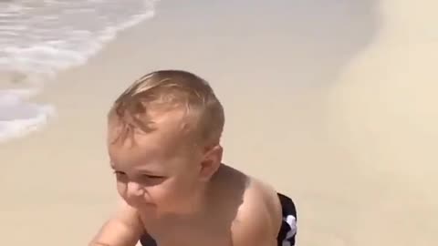 Funny baby 🍼 reaction on the beach ⛱️