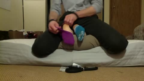 Tickling feet in socks