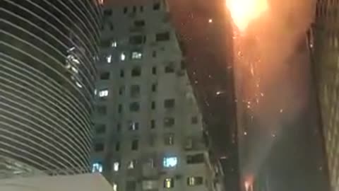 NOW - Skyscraper under construction on fire in Hong Kong.