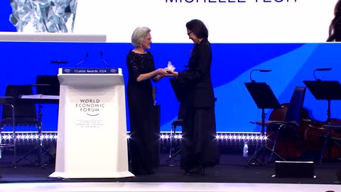 Michelle Yeoh receives award at WEF opening