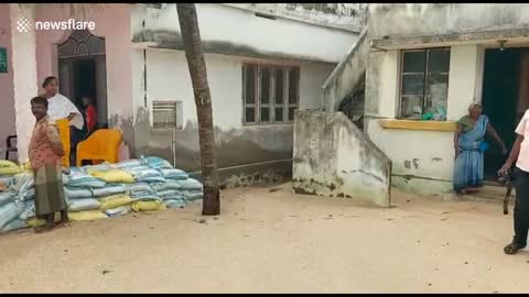 Houses are sinking as seawater creeps into a fishing village in South India.