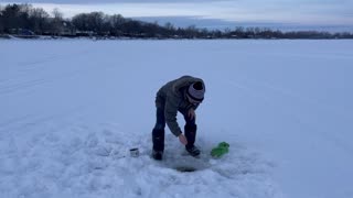 Canadian icefisherman catches smallest fish ever