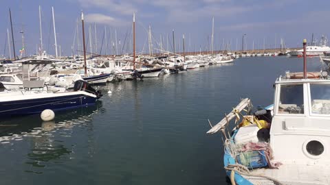 Stunning front view of the seaport / Anchored Boats mooring sound