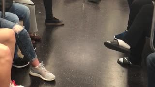 Man in green pants passed out on subway train