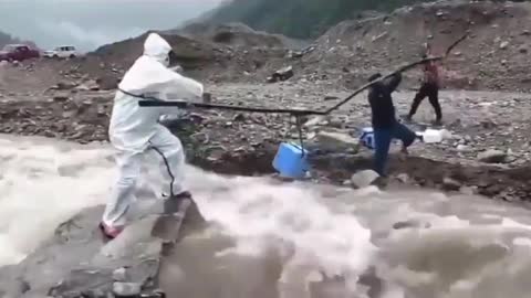 Amazing : Nepal Health workers supplying COVID vaccine during floods in remote areas