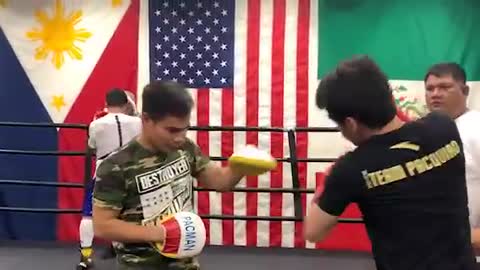 MANNY PACQUIAO TRAINS SON