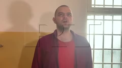 DPR captive Aiden Aslin sings Russian anthem