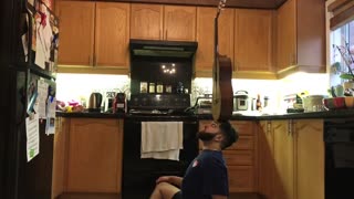 Guy Skillfully Balances Various Objects on His Head