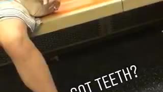 Got teeth? dentures under orange subway train seat