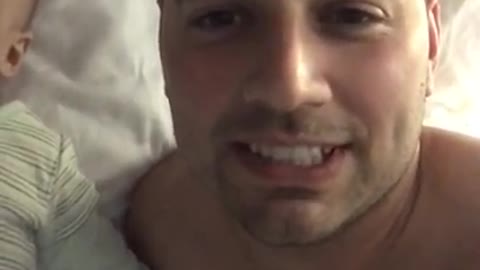This Dad Tells His Sleeping Baby "I Love You." What the Baby Does Next is Absolutely Priceless.
