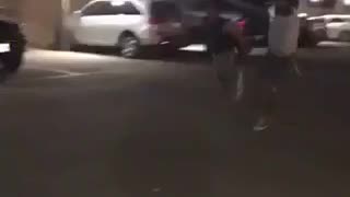 Guy in black shirt running and falls down