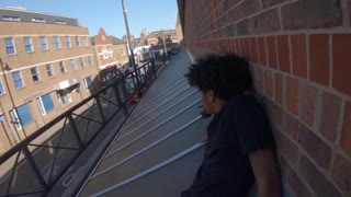 Dudes Hitch a Free Ride on Bus Roof